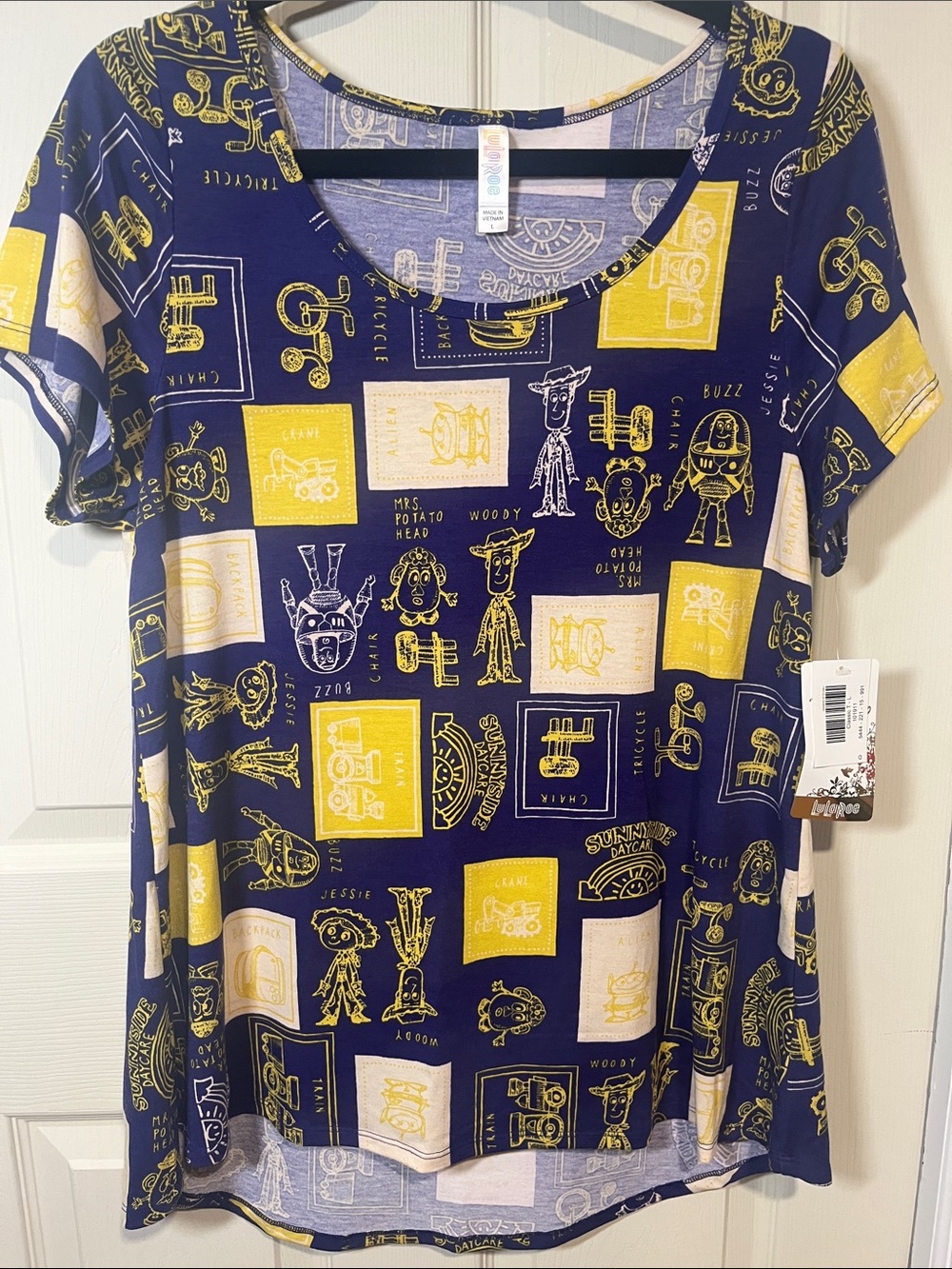 LuLaRoe Navy, Yellow & Cream Graphic Scoop Neck Top